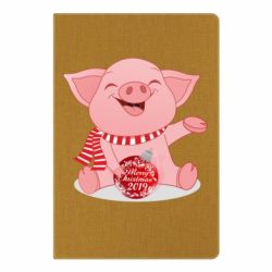 Блокнот з принтом Funny pig with a Christmas toy