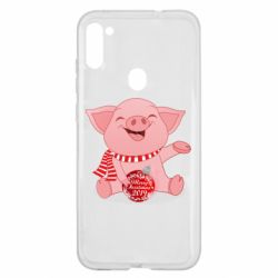 Чохол для Samsung A11 / M11 Funny pig with a Christmas toy - PrintSalon